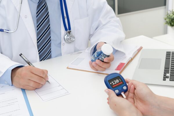 Patient receiving diabetes consultation at Wellness @ The Clinic in Nelson & Pendle