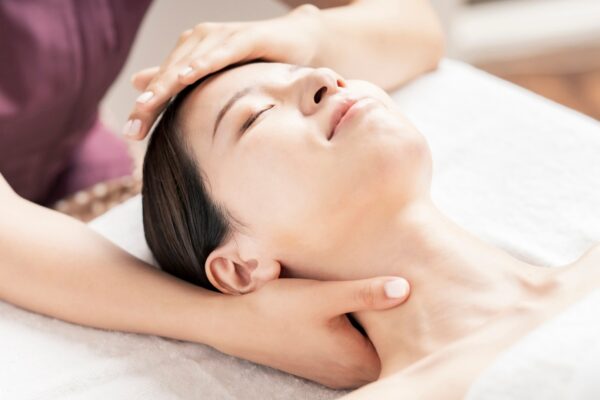 Client enjoying express facial treatment in Nelson & Pendle
